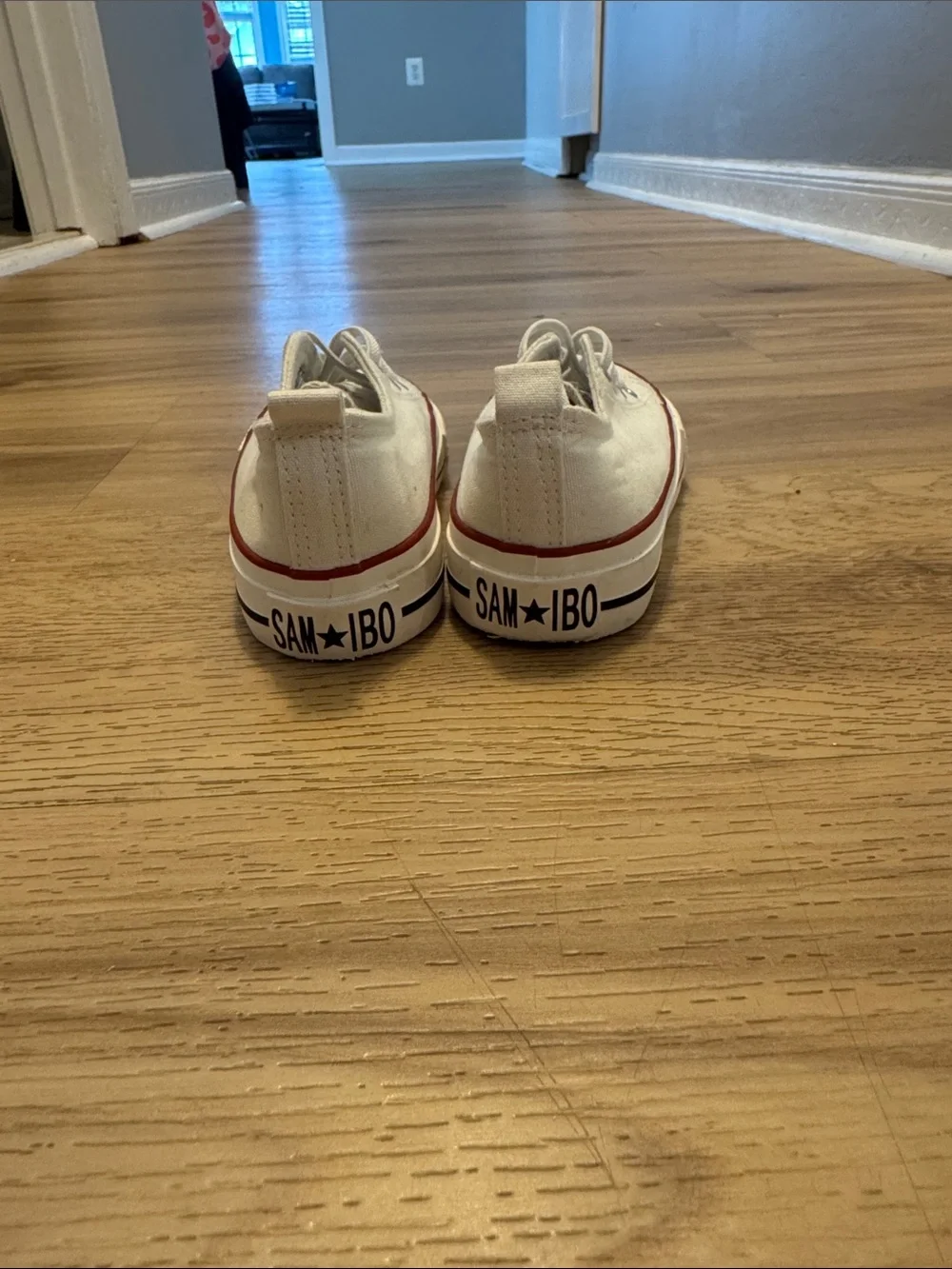 Skechers White Kids Sneakers with Red Stripe